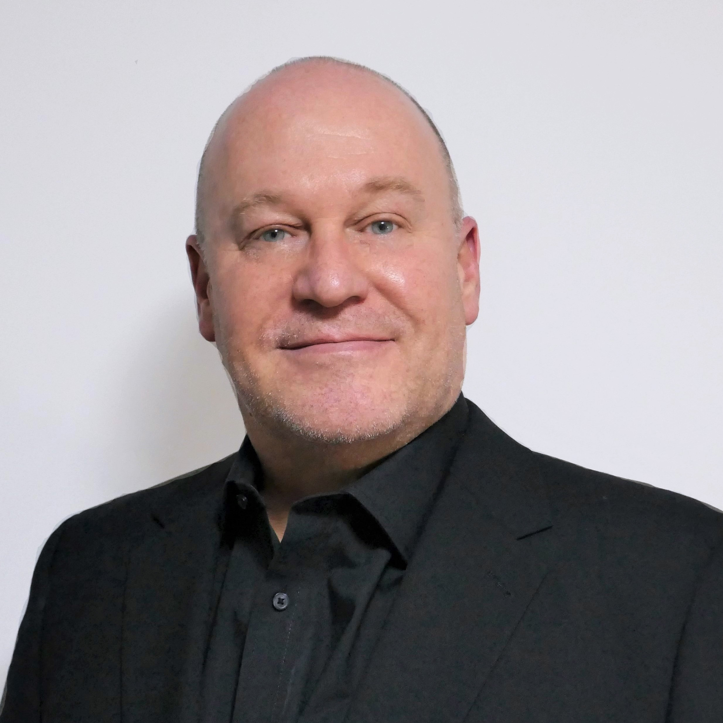 Headshot of Adrian Devine